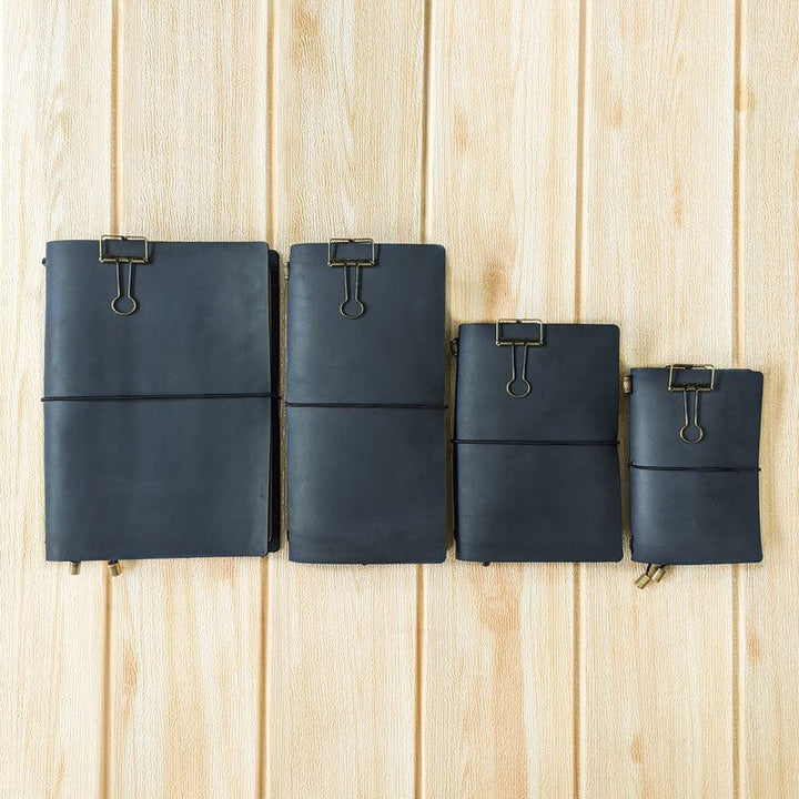Dusty Blue TBC Travellers Journals - The Black Canvas