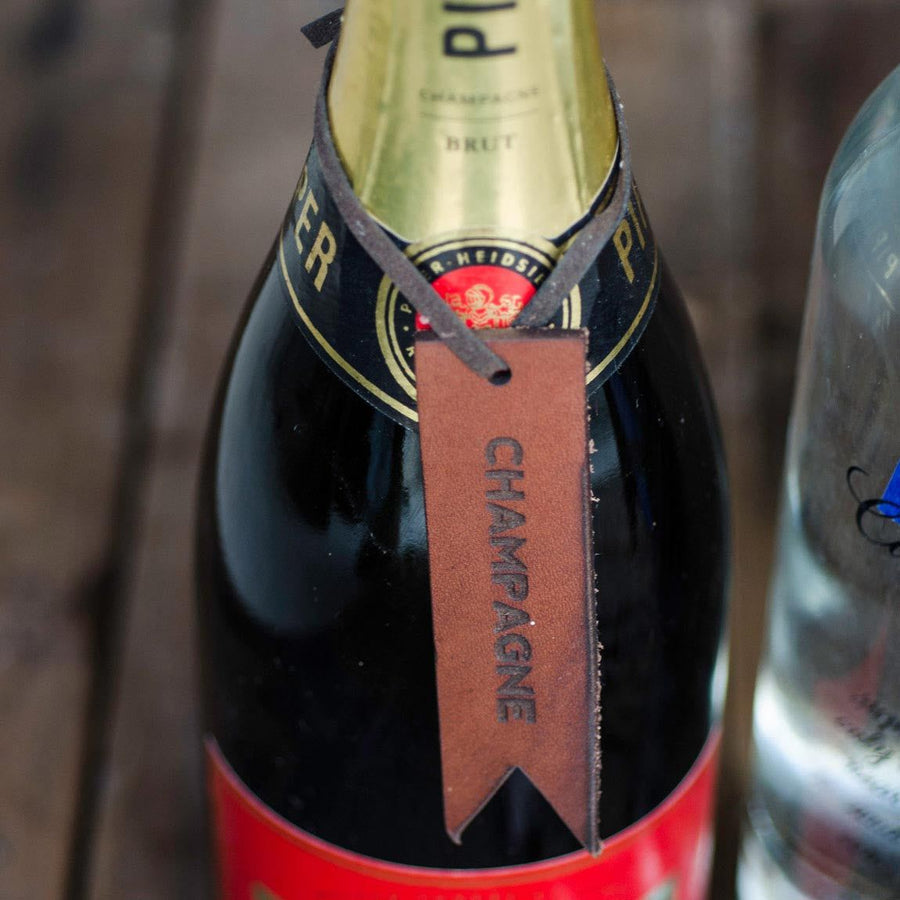 Leather laser engraved bottle tag champagne