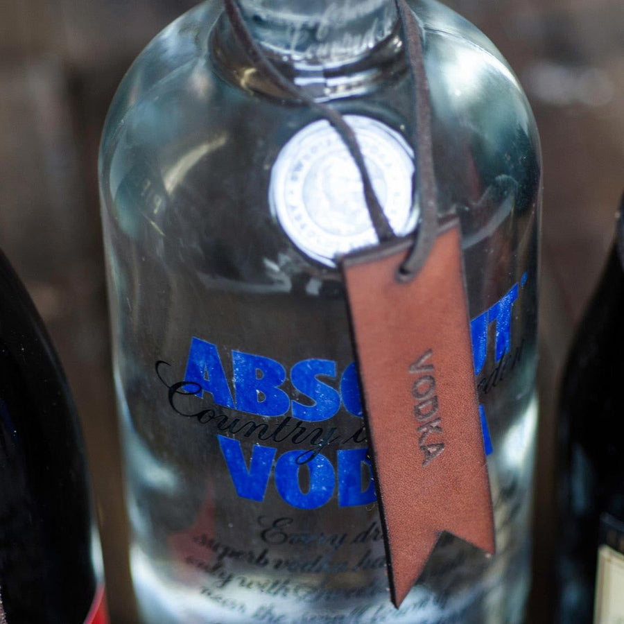 Leather laser engraved bottle tag vodka