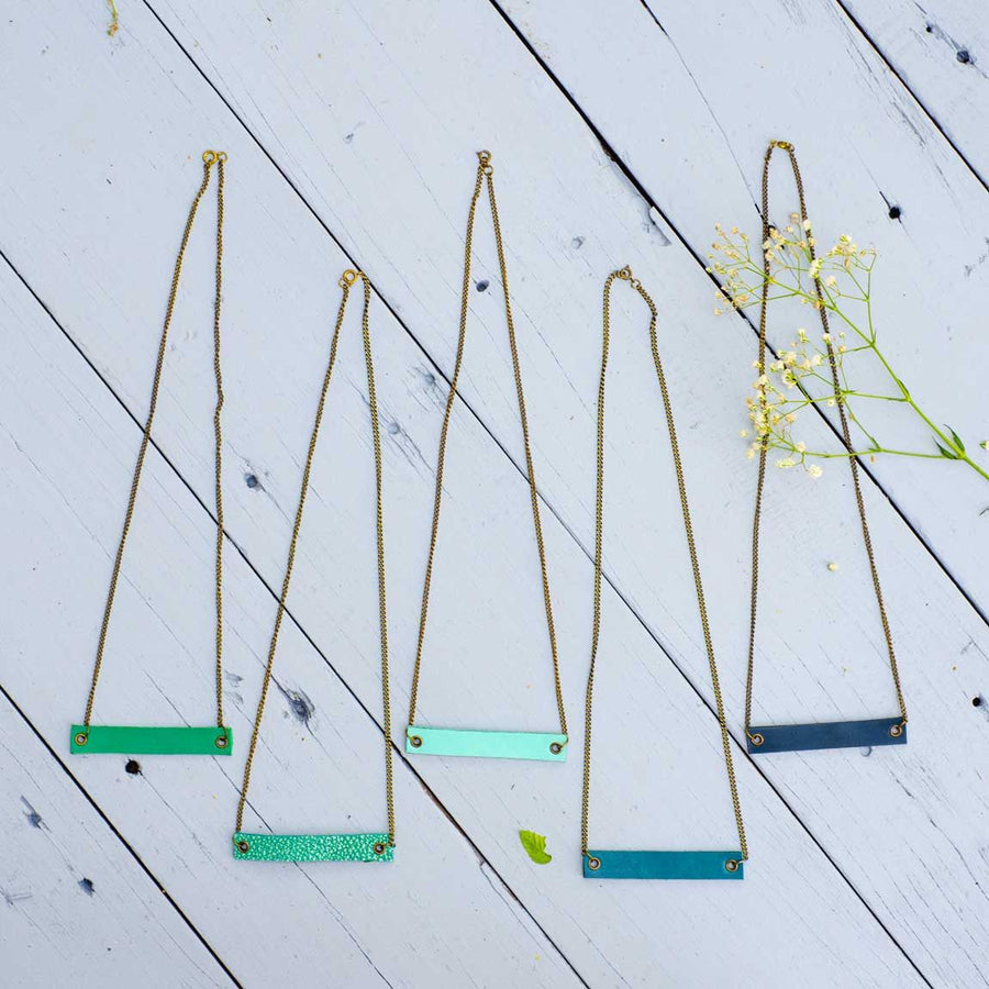 Minimalist rectangle shaped leather neck pieces, leaf green, sea green, mint, turqouise and navy blue