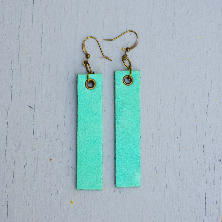 mint colored minimalist rectangular leather earrings front top view