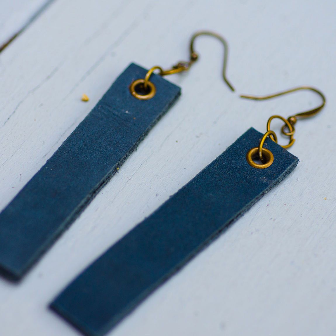 navy blue minimalist rectangular leather earrings with antique details