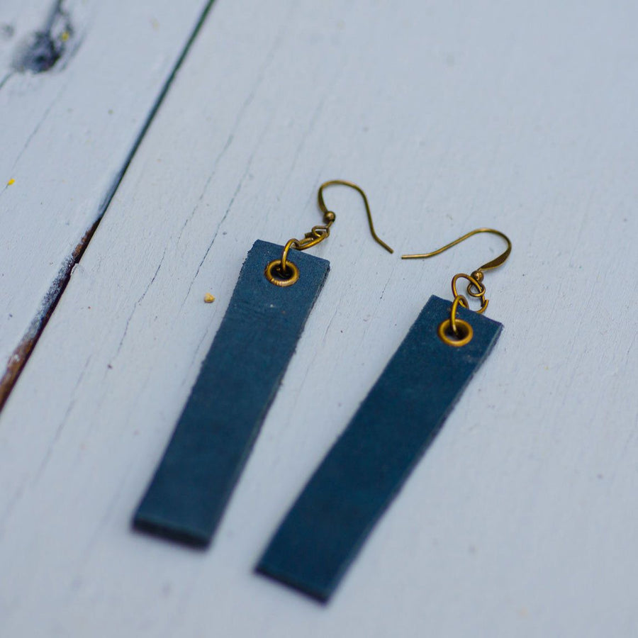 navy blue minimalist rectangular leather earrings with antique hooks, side view