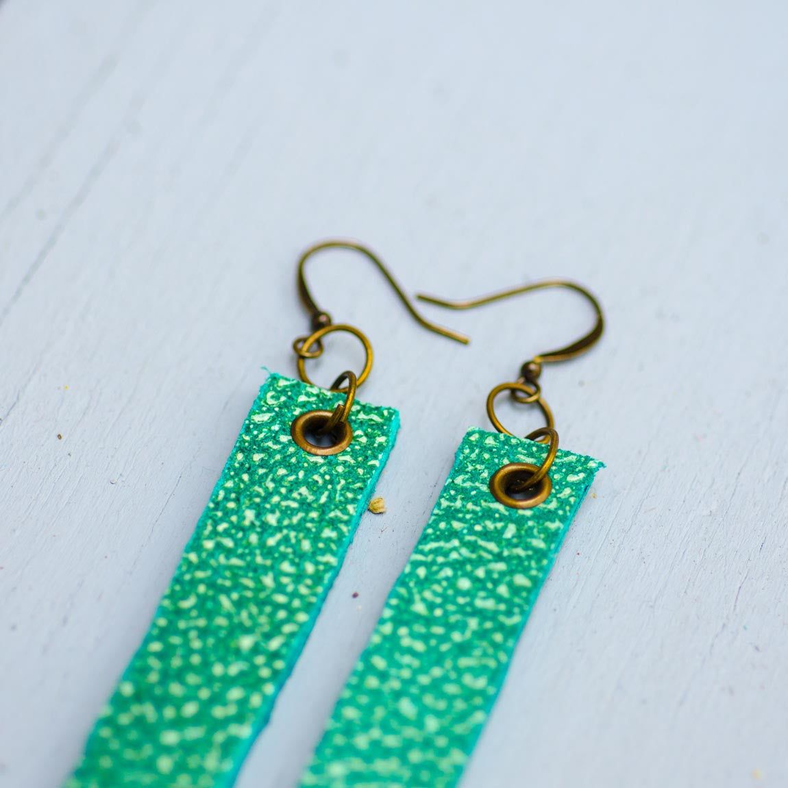 sea green minimalist rectangular textured leather earrings with antique details