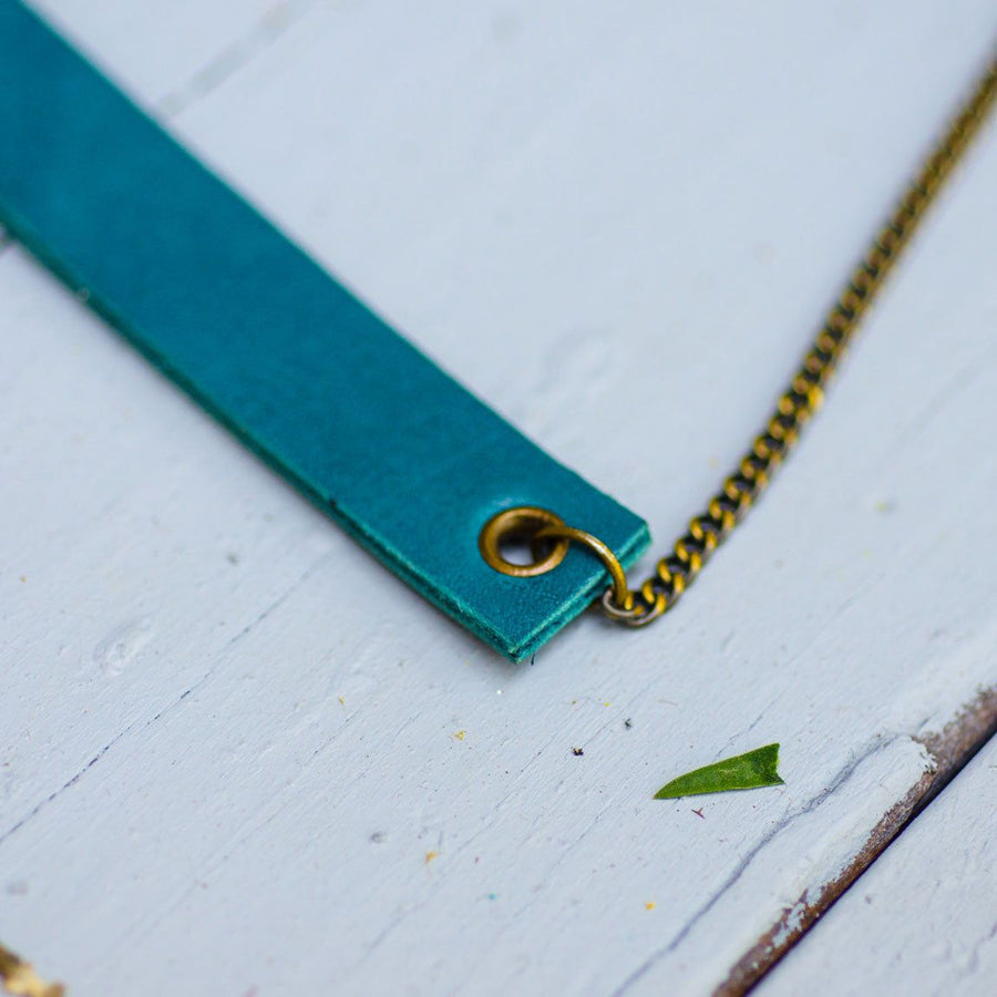 tueqouise minimalist rectangular neck piece with antique details
